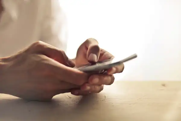 Hands holding a smartphone